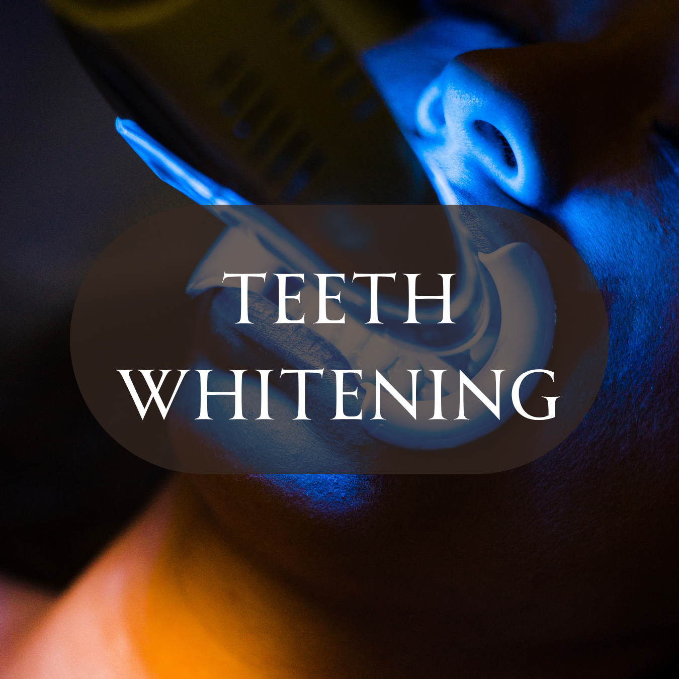 Blue LED light used during a professional teeth whitening treatment