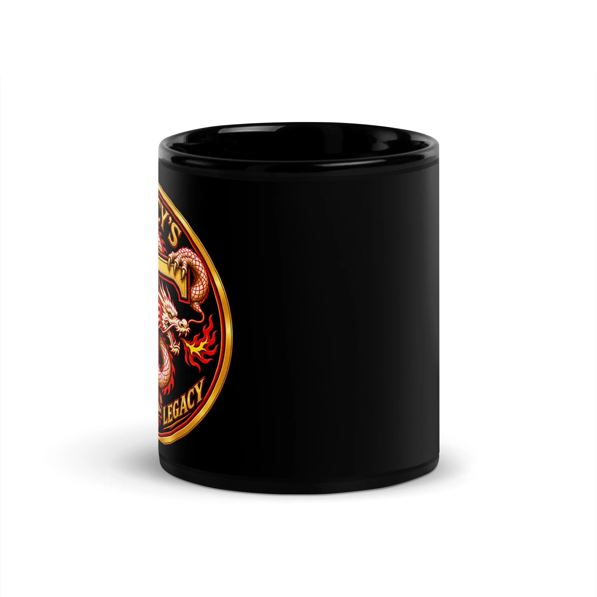 11 oz Tracy’s Kenpo Legacy black mug, angled view with the dragon logo partly visible.