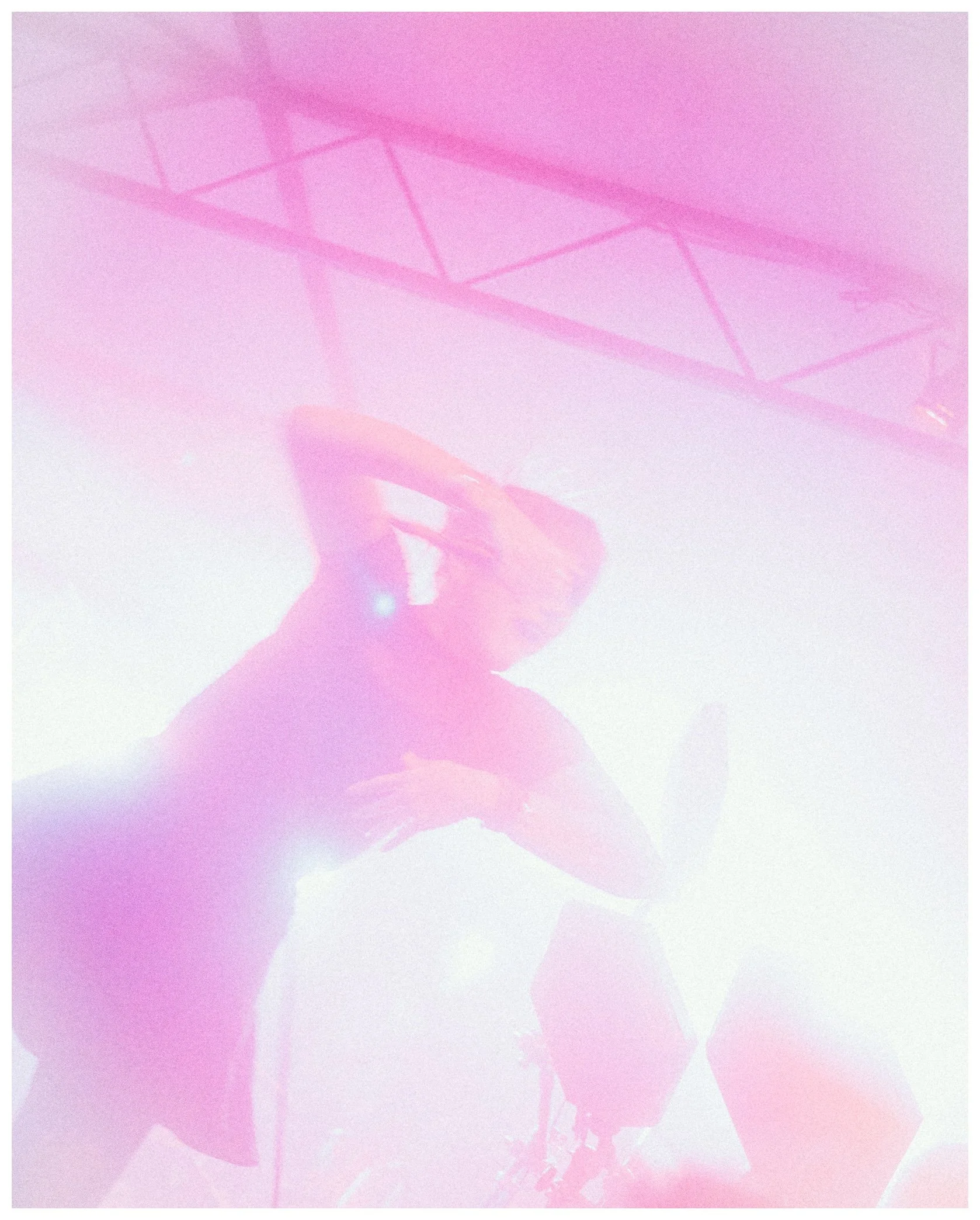 A scene with pink hues, featuring the silhouette of a person holding a phone and a faint outline of a game ping pong table in the background.