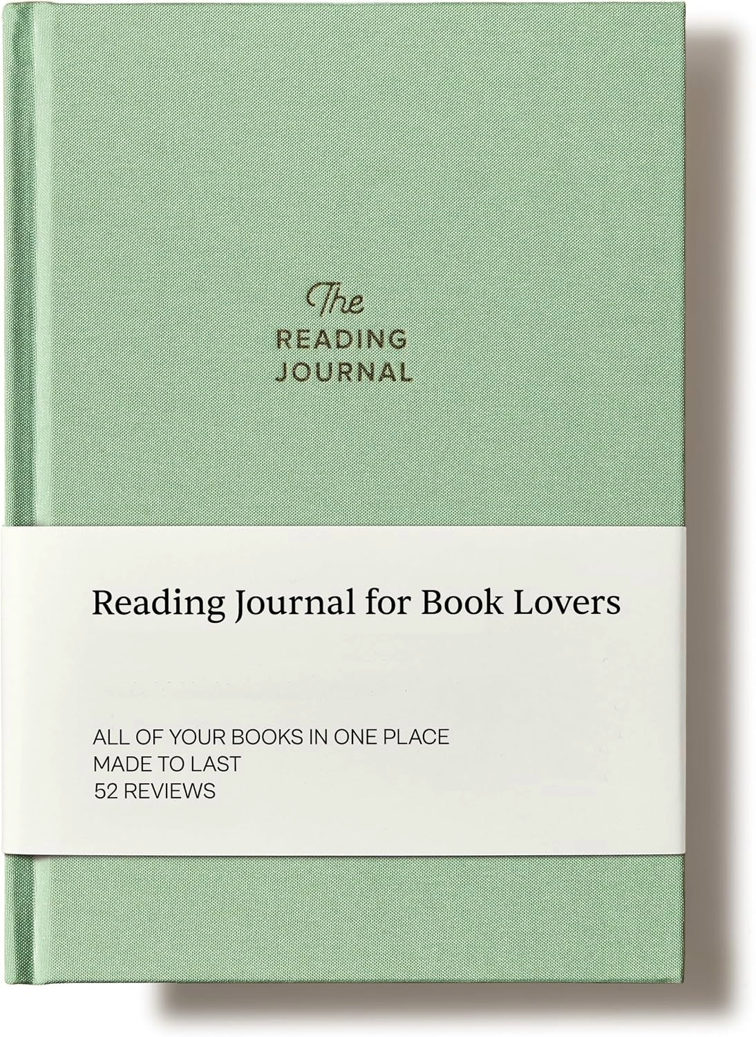 Sage-green hardcover reading journal with a white band labeled “Reading Journal for Book Lovers,” conveying a calm, literary, organized feel.