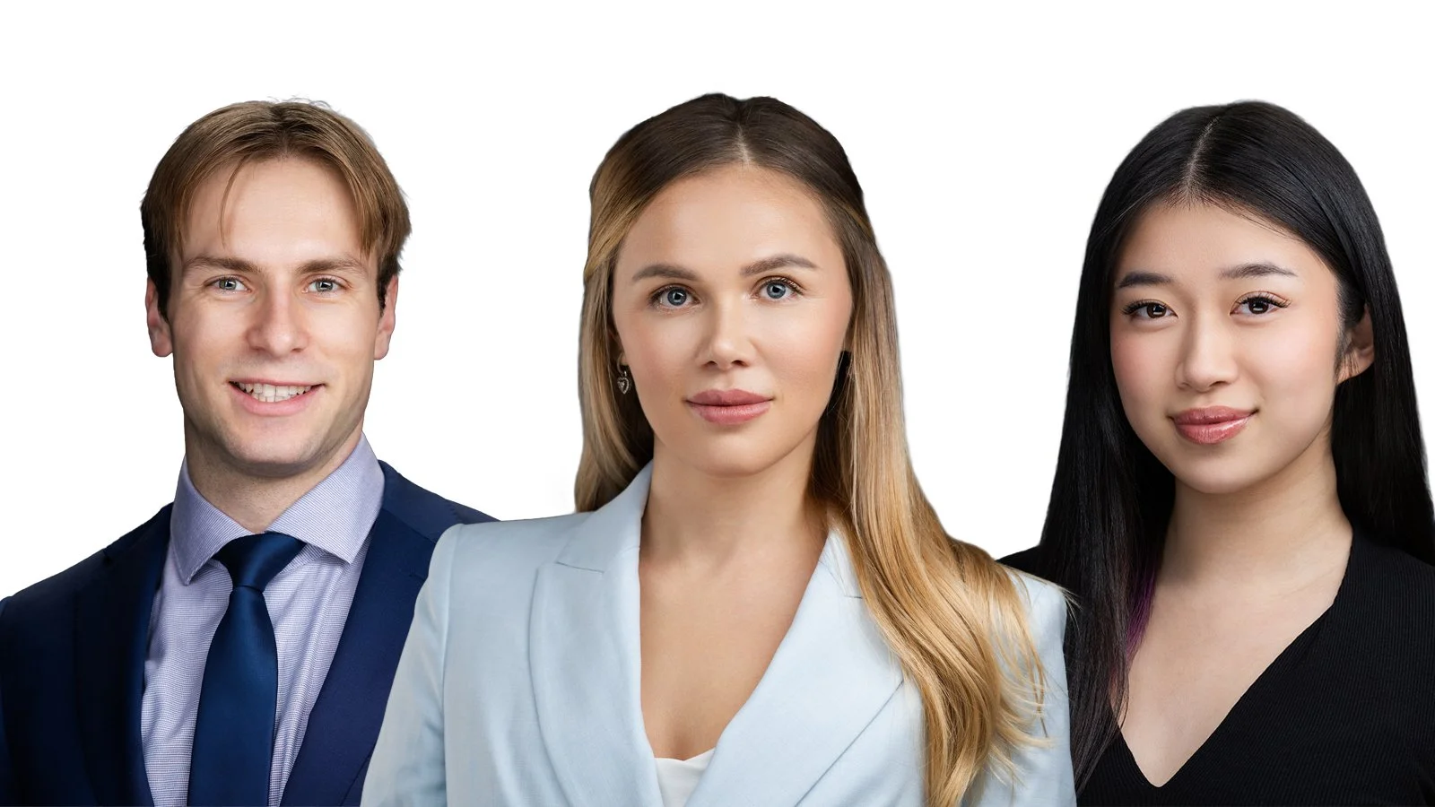 Professional photo of three people, a man and two women, dressed in business attire, standing against a white background.