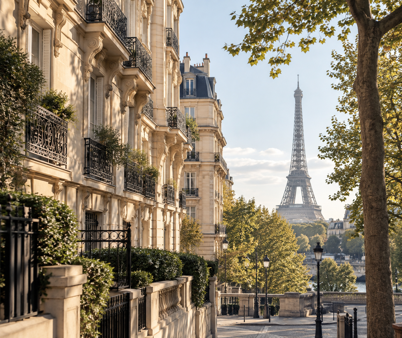 Parisian street with ornate buildings, greenery-lined sidewalk, and the Eiffel Tower in the distance under a partly cloudy sky.