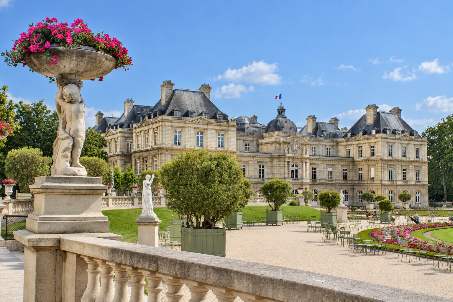 A grand historic estate with a lush garden, decorative statues, and a large stone building under a blue sky.