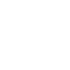 Silhouette of a construction worker wearing a hard hat.
