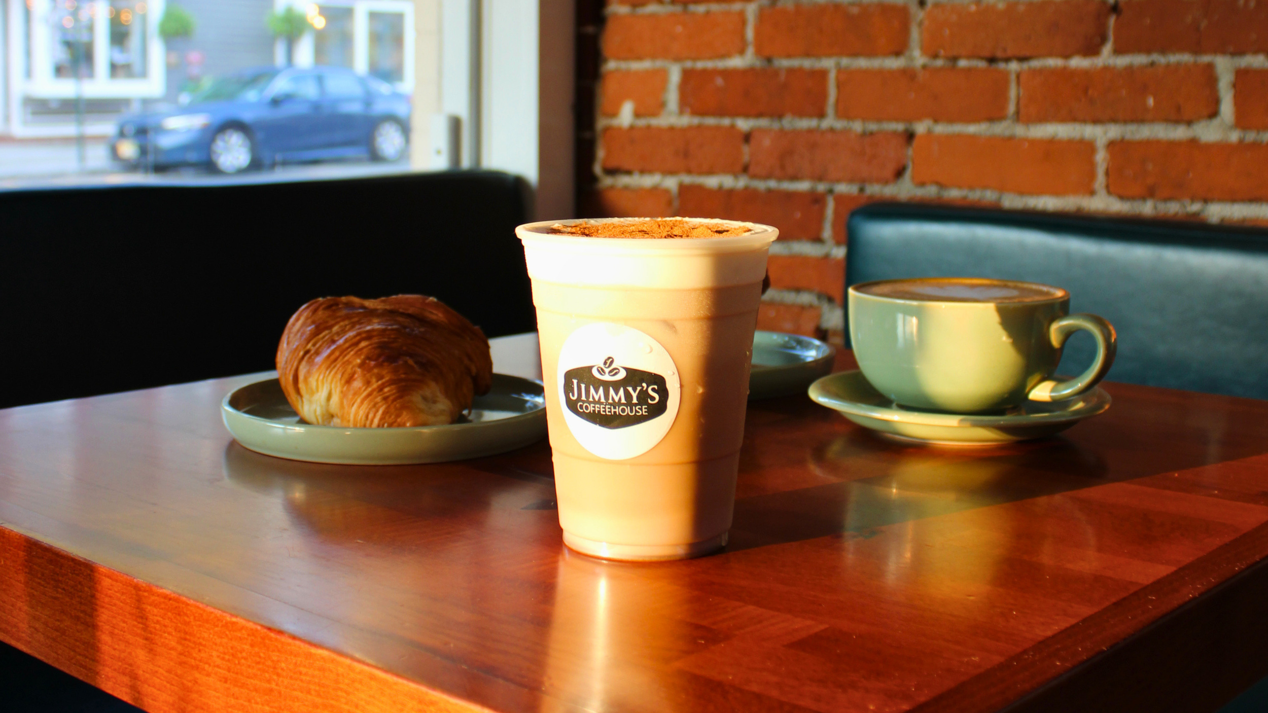 Iced coffee, hot coffee, and a croissant at Jimmy’s Coffeehouse in downtown Clinton, NJ.