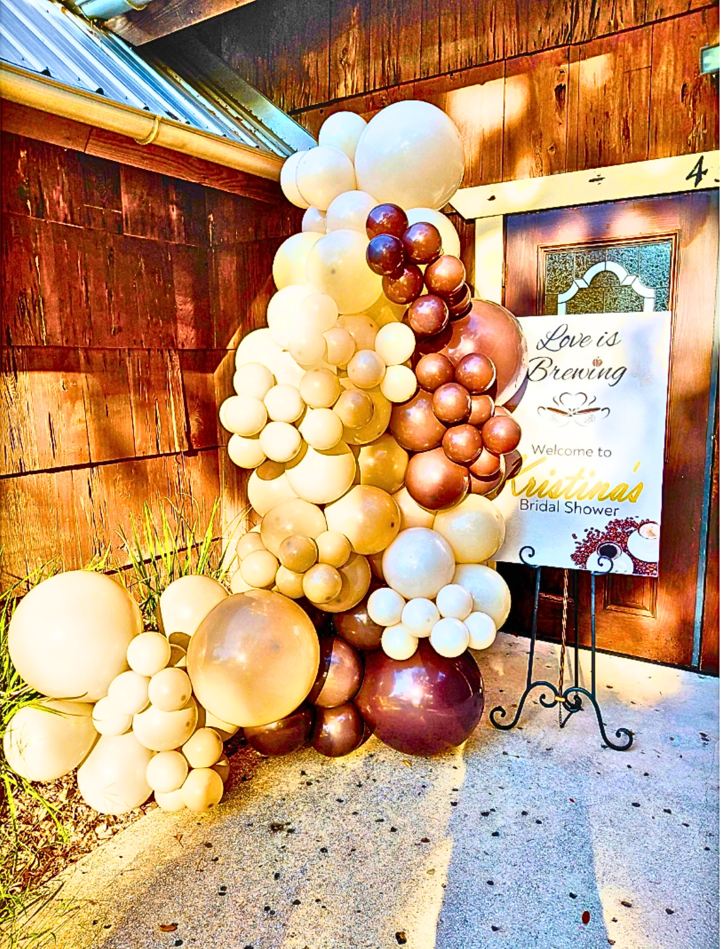 Love Is Brewing bridal shower welcome display.