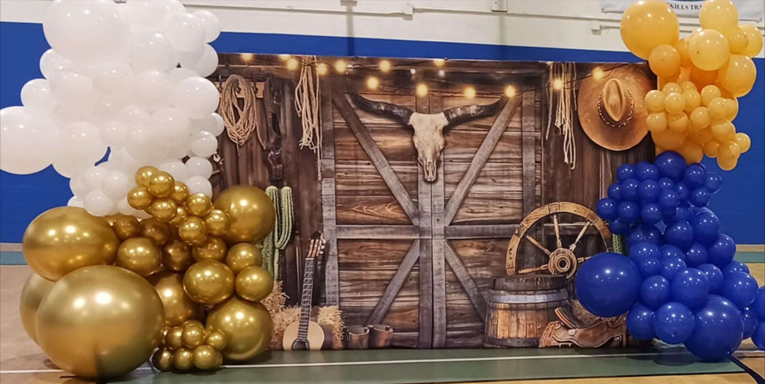 Country themed graduation celebration with rustic accents, fun details, and a cheerful, down-home vibe.
