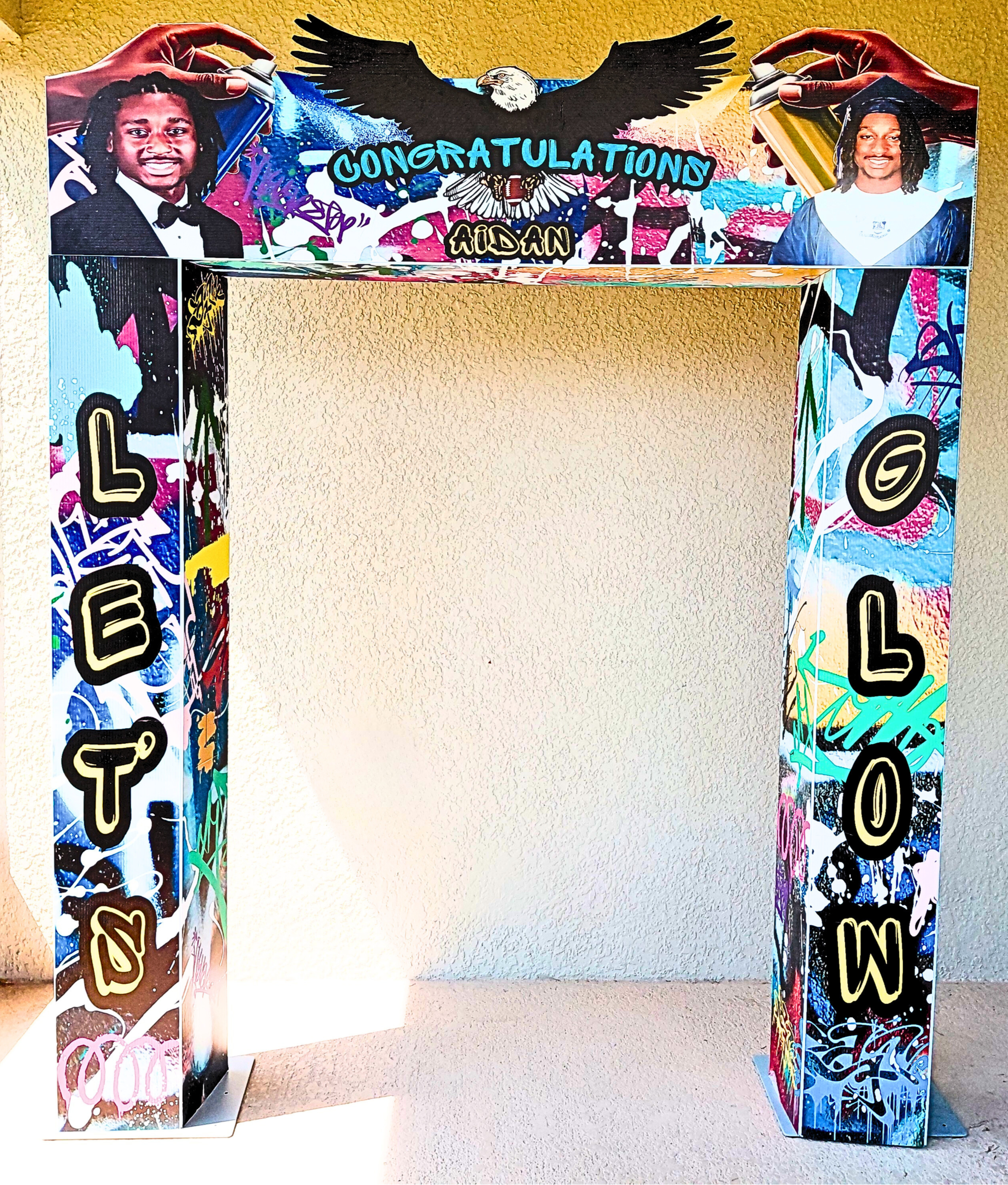An elevated Let’s Glow graduation celebration designed with radiant neon lighting, vivid color pops, and a dynamic, immersive vibe.