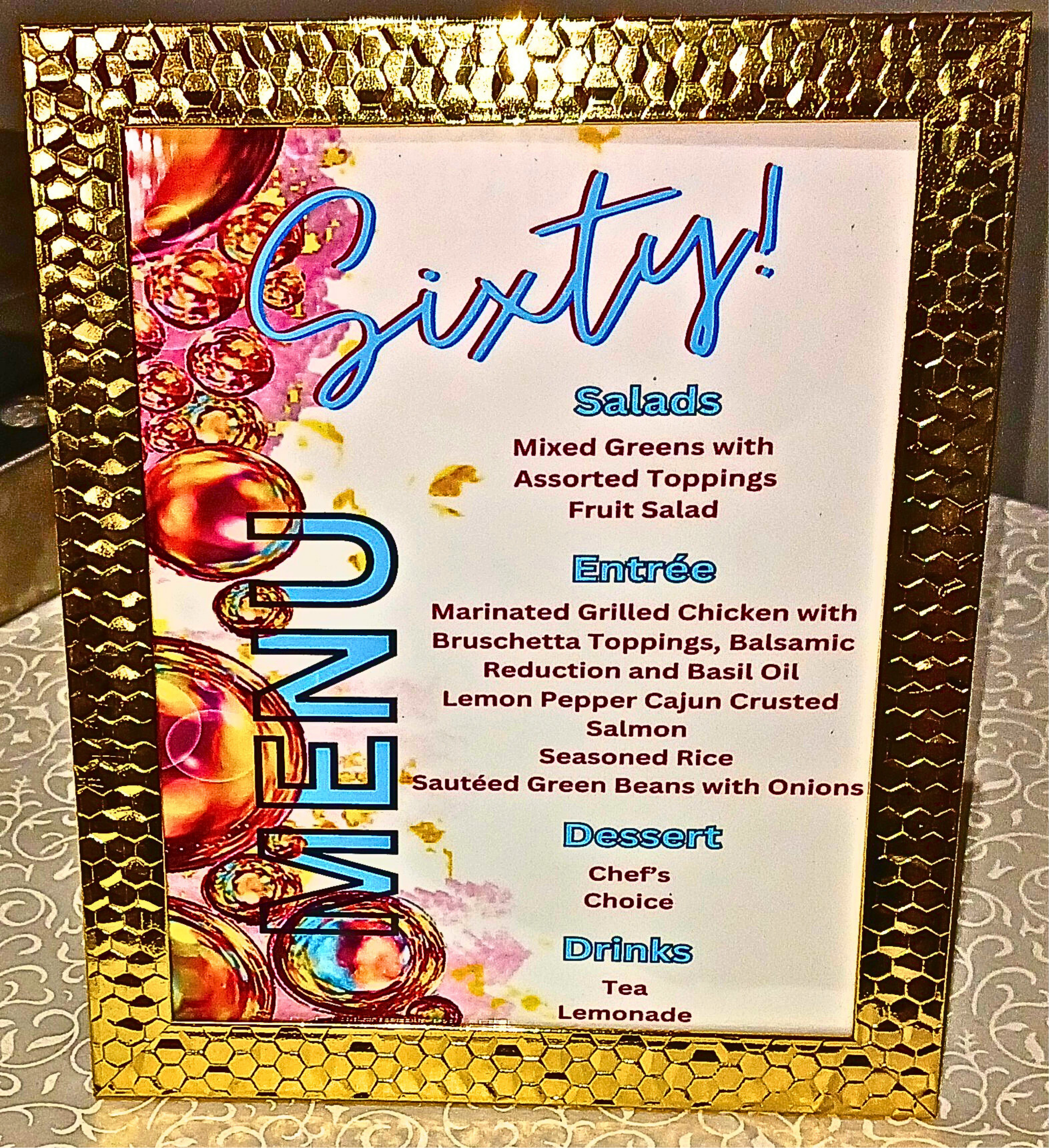 A vibrant 60th birthday celebration featuring a rich rainbow color palette, velvet tablecloths, lush rainbow florals, and touches of gold for a timeless, joyful look.  A fabulous milestone beautifully honored.