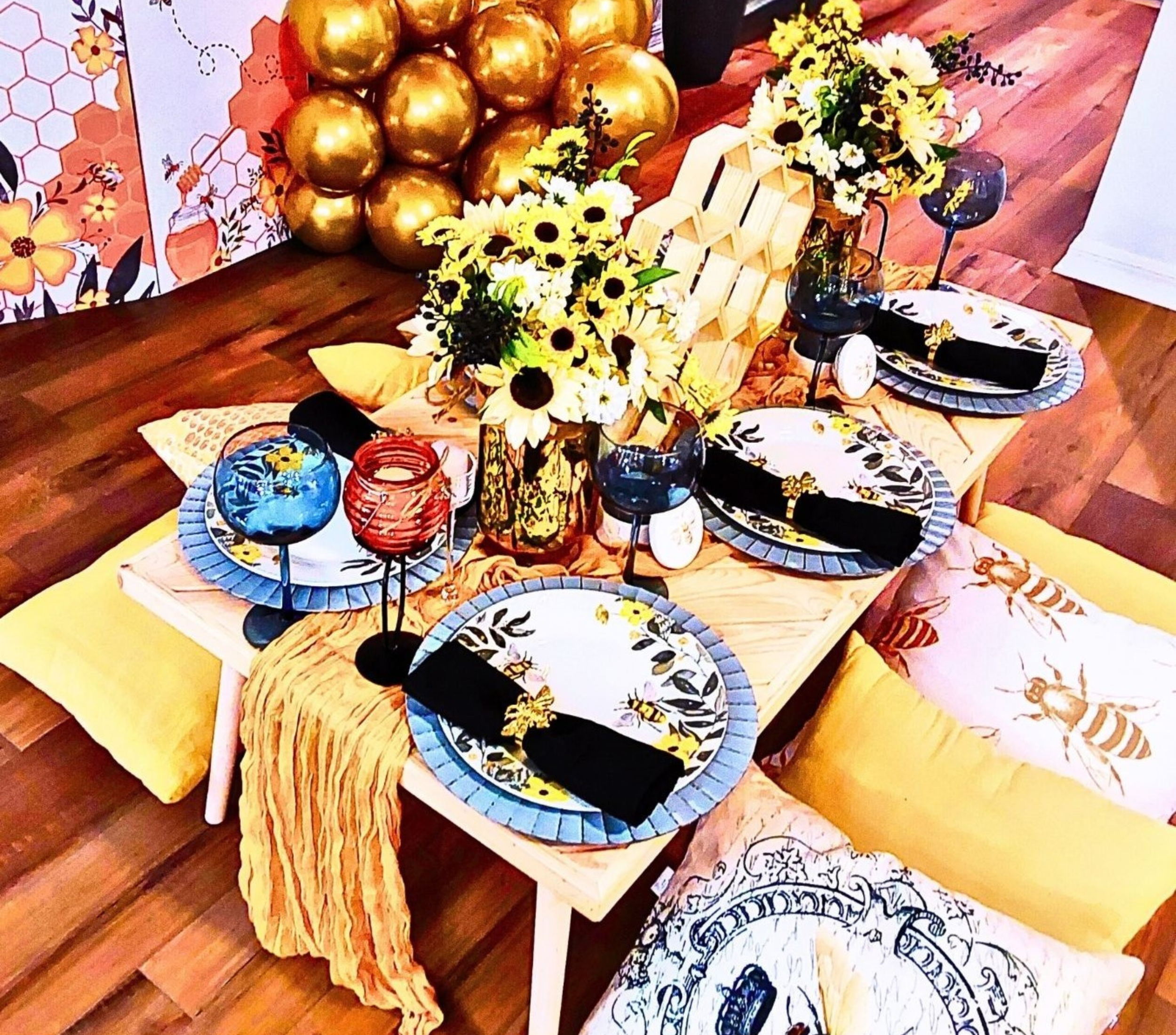 A Queen Bee birthday dinner adorned with charming bee accents and small, intentional details that bring the theme to life.
