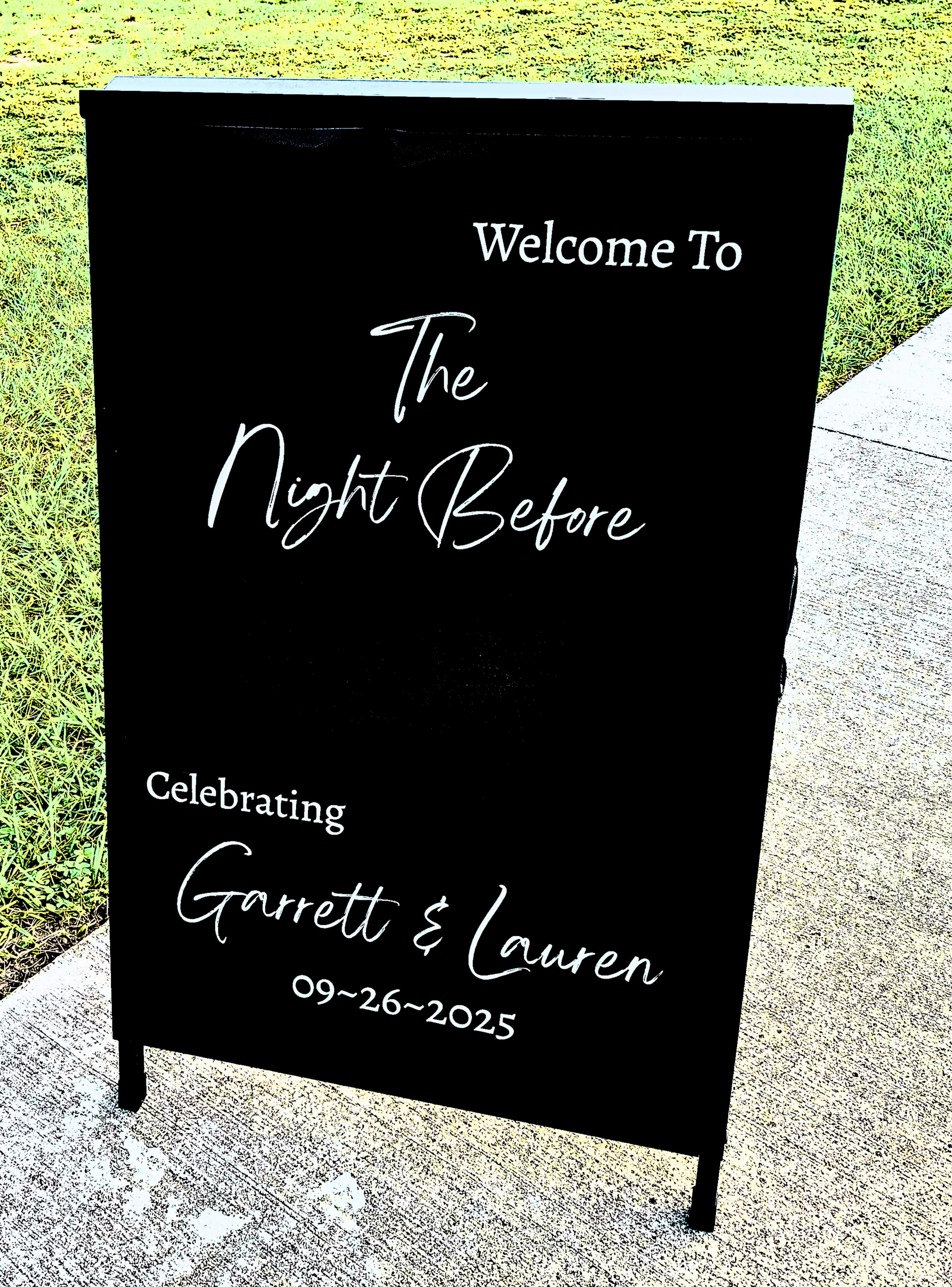 A welcoming sign greeting guests as they arrive for an intimate and joy filled rehearsal dinner. 
