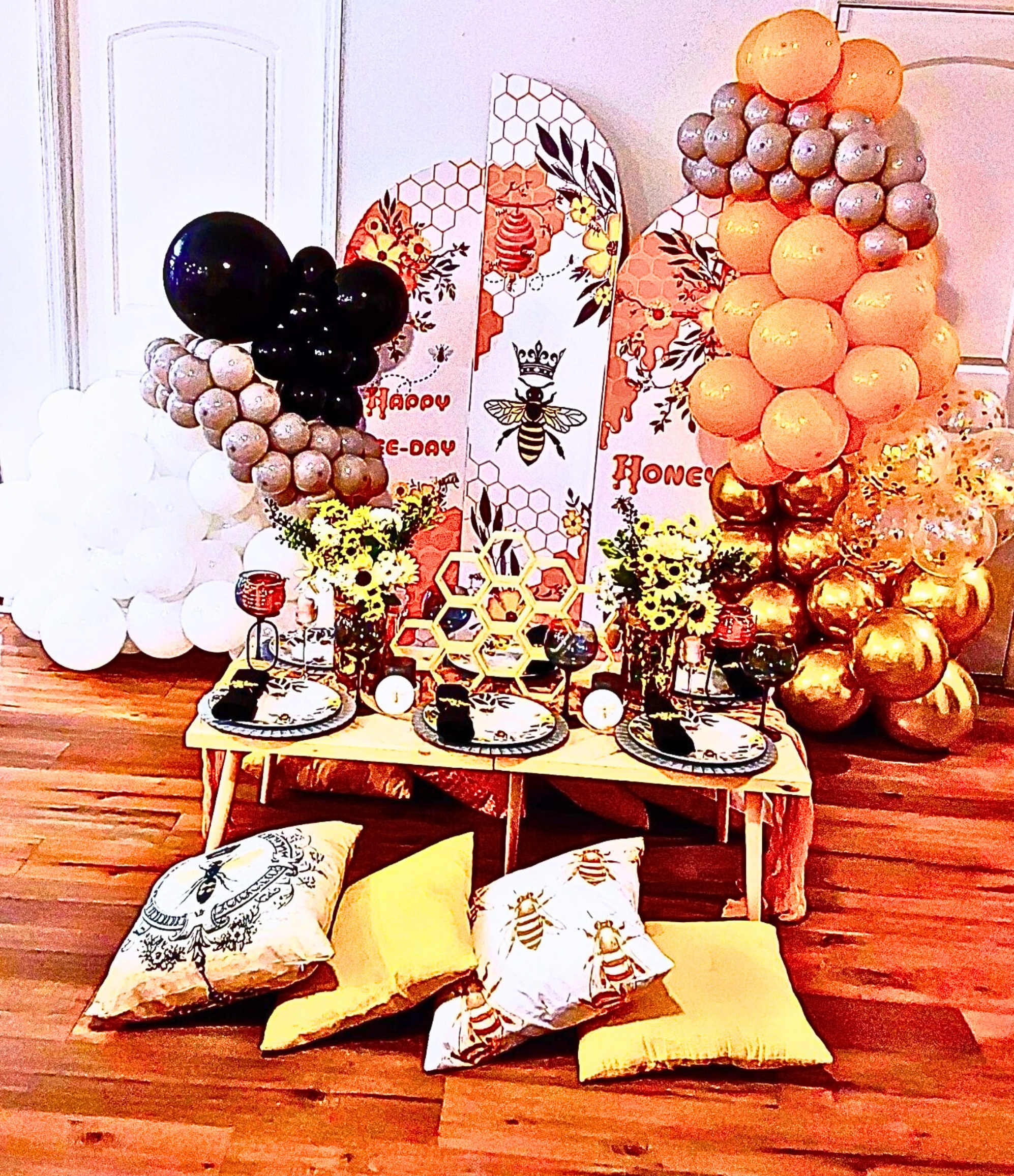 A Queen Bee birthday dinner adorned with charming bee accents and small, intentional details that bring the theme to life.