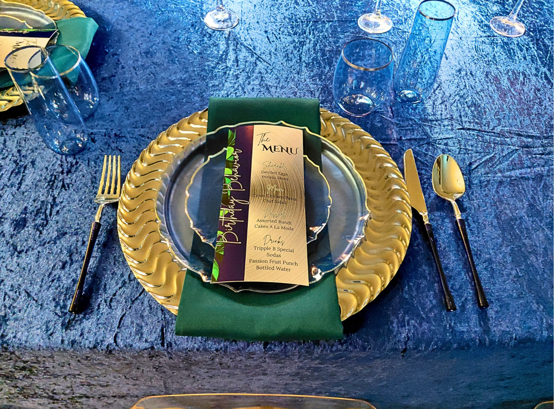 A sophisticated Birthday Behavior themed dinner designed for our male client.  By skipping balloons and keeping florals minimal, we created a clean, elegant look.  Rich blues and greens with silver accents brought the palette together for a timeless 