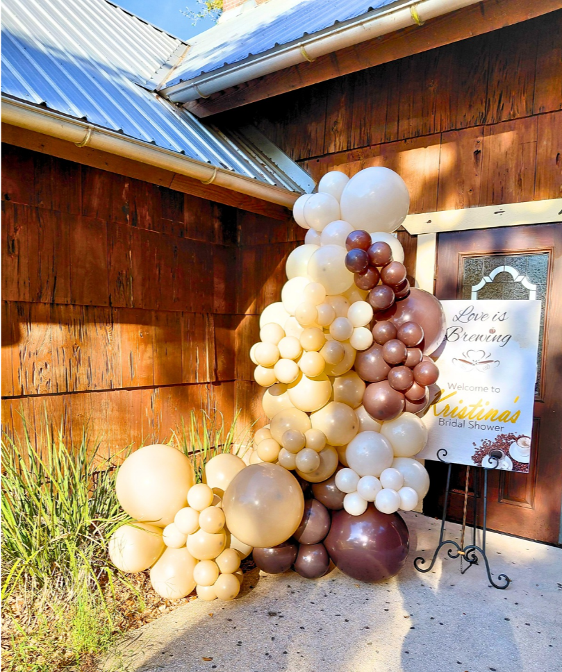 Love Is Brewing bridal shower welcome display.
