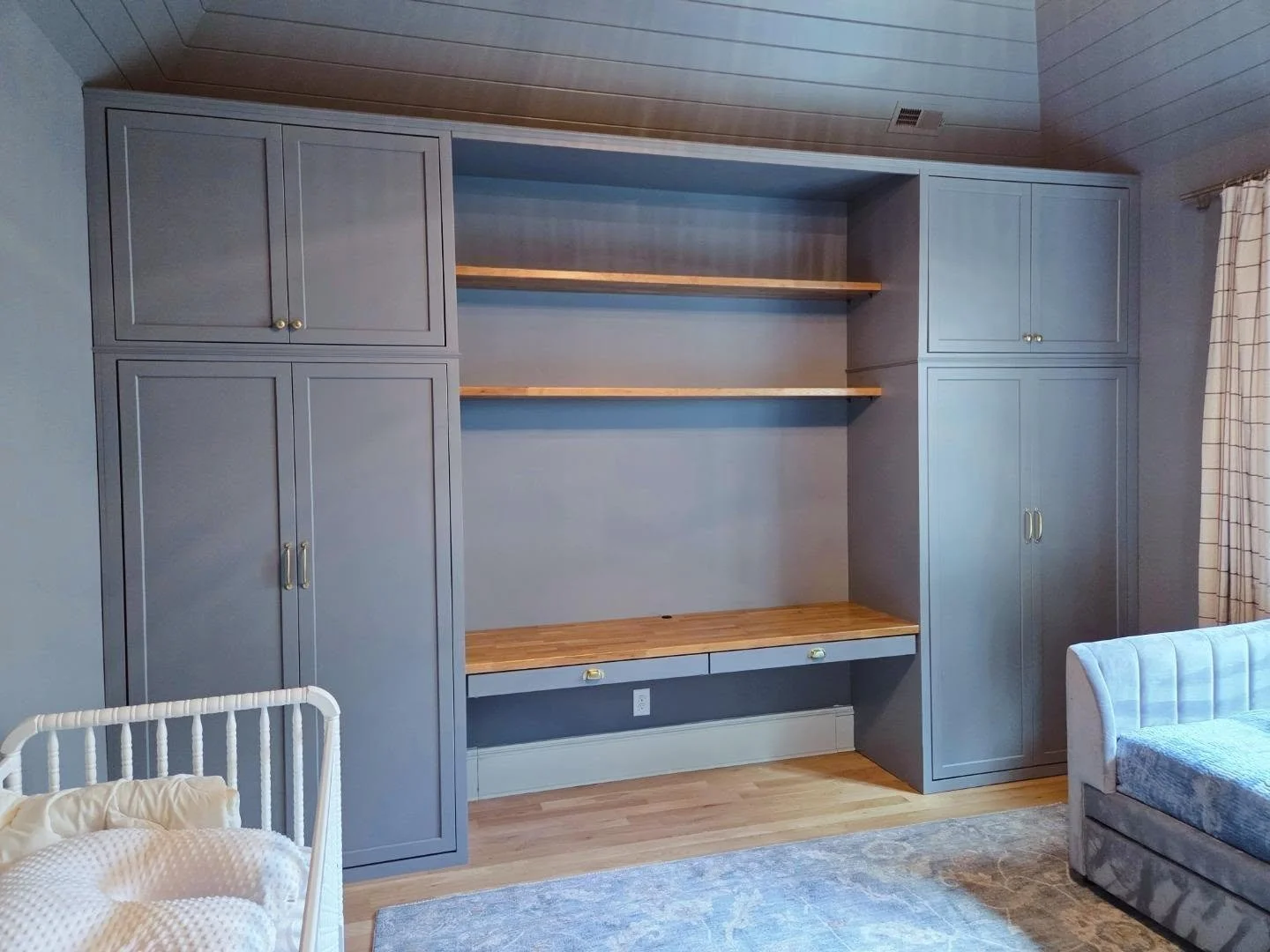 Nursery - This installation is to accommodate brand new twins that arrived home literally one hour before I finished. Perfection doesn't exist, but perfect timing can. Inset doors, double closet rods, bottom slide-outs being delivered shortly, White 