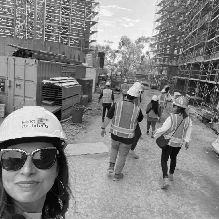 Lydia Alfred and fellow design professionals visiting an active construction site during her years at HMC Architects.