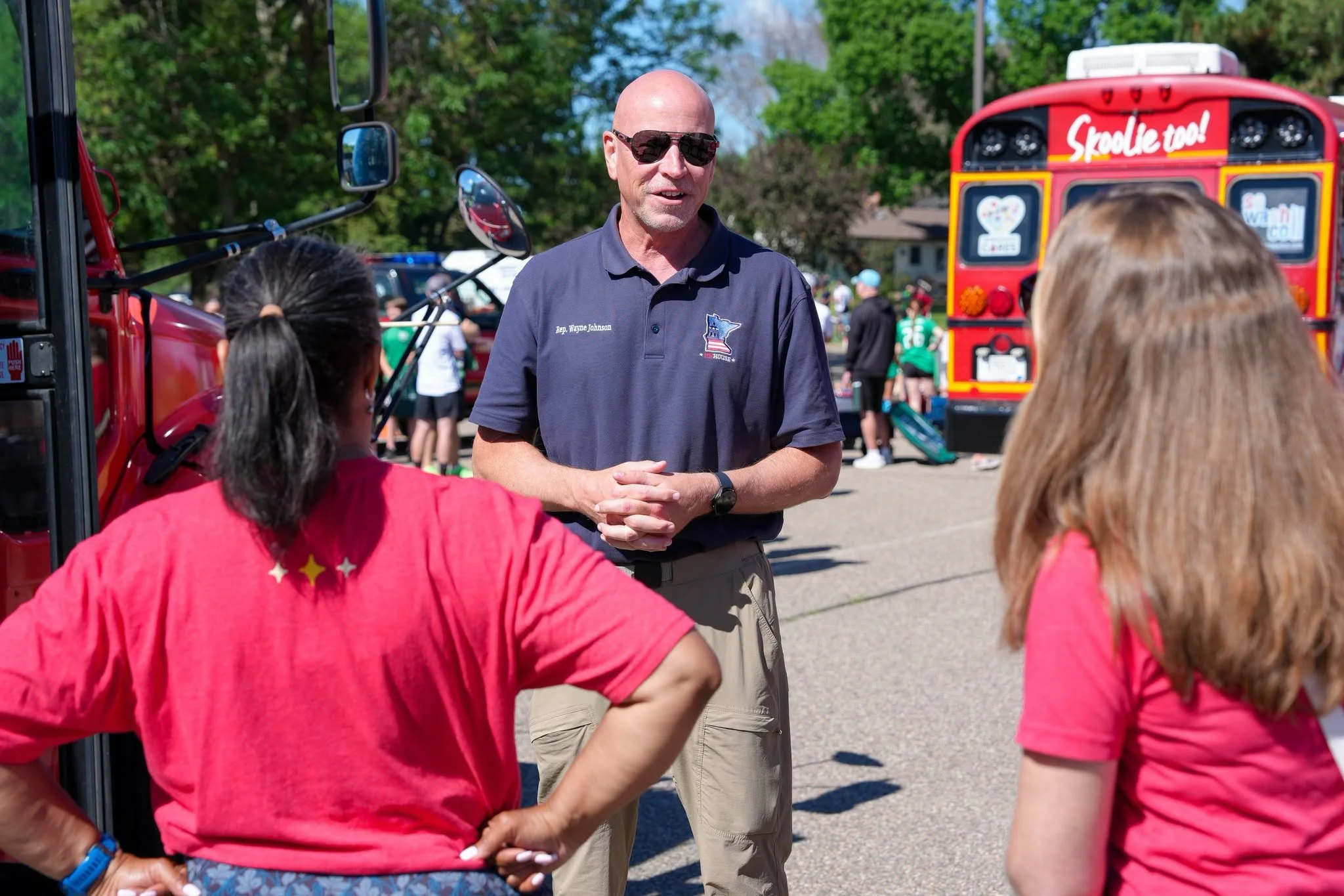 Wayne Johnson talking with voters.