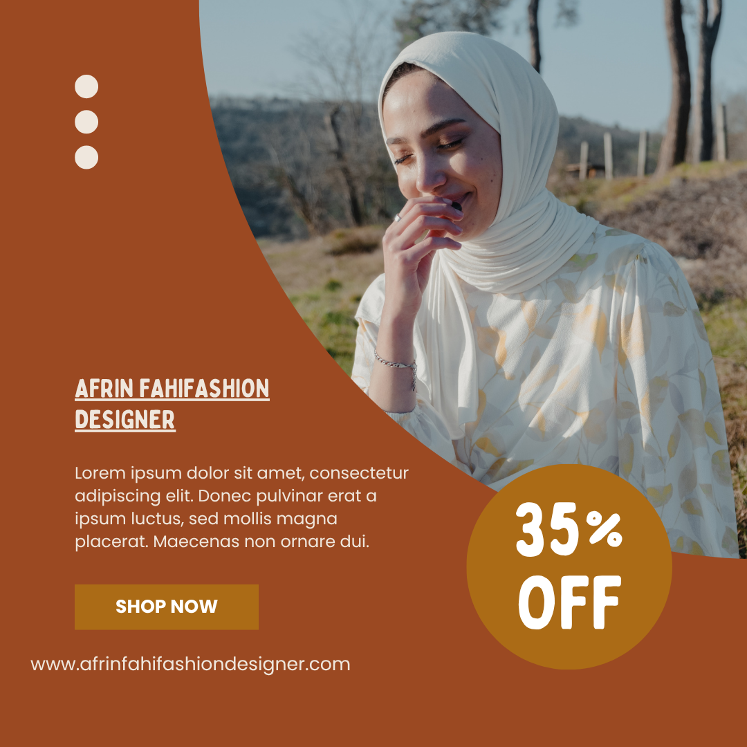 A woman wearing a white headscarf and floral dress outdoors, with trees and hills in the background, smiling and touching her chin.