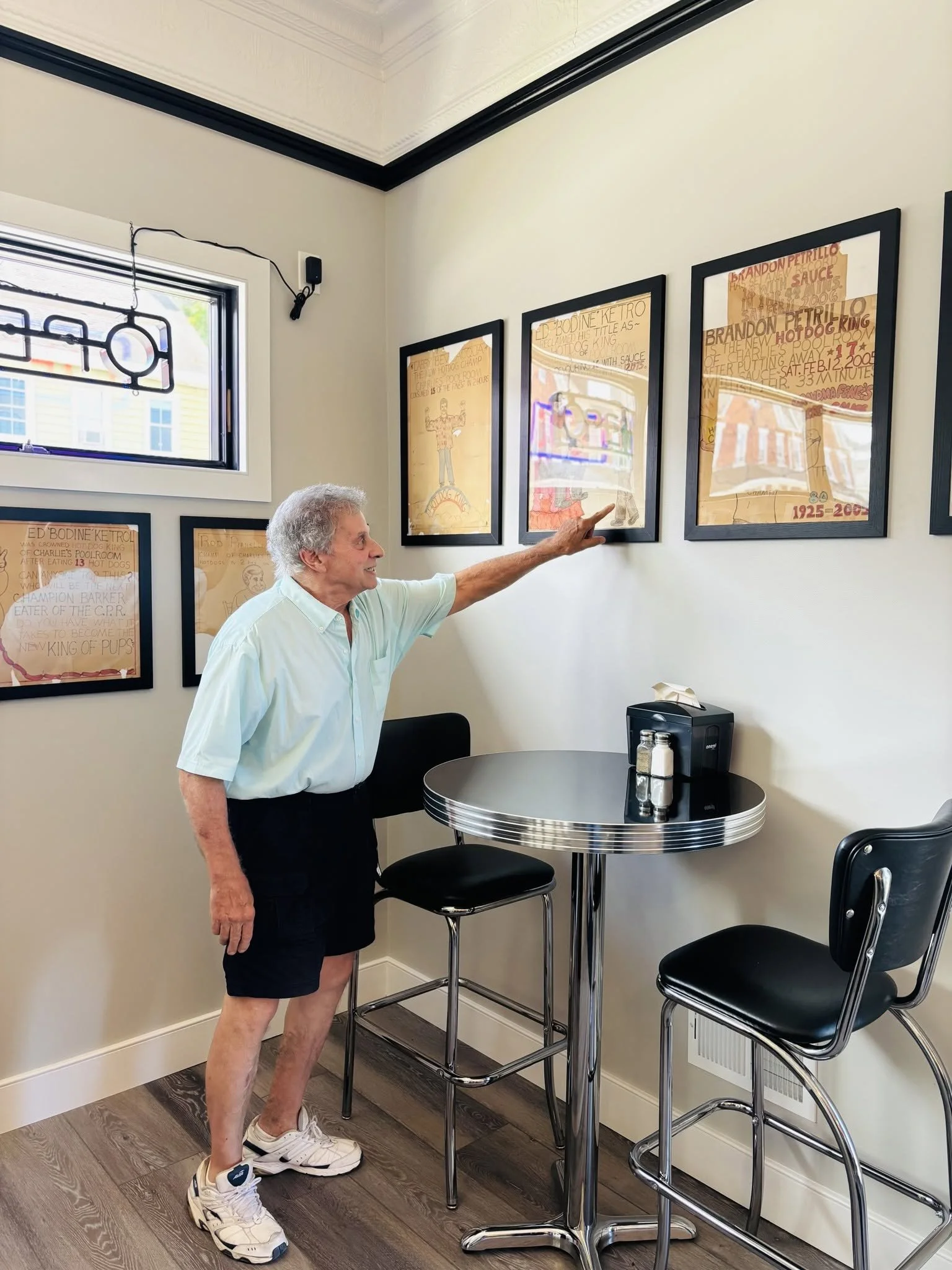 The artist behind the hot dog king posters