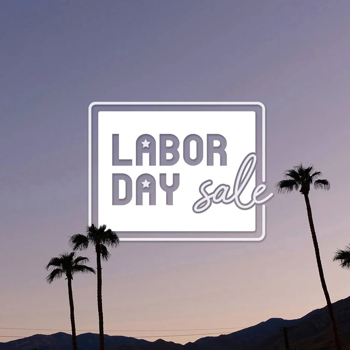 Silhouette of palm trees against an evening sky with a sign reading 'Labor Day Sale' in the center.