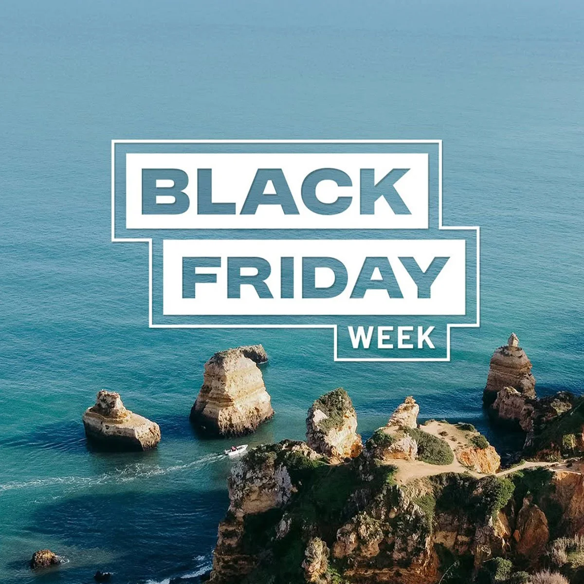 Aerial view of rocky coastal cliffs and boats in blue ocean with overlaid text 'Black Friday Week' in white
