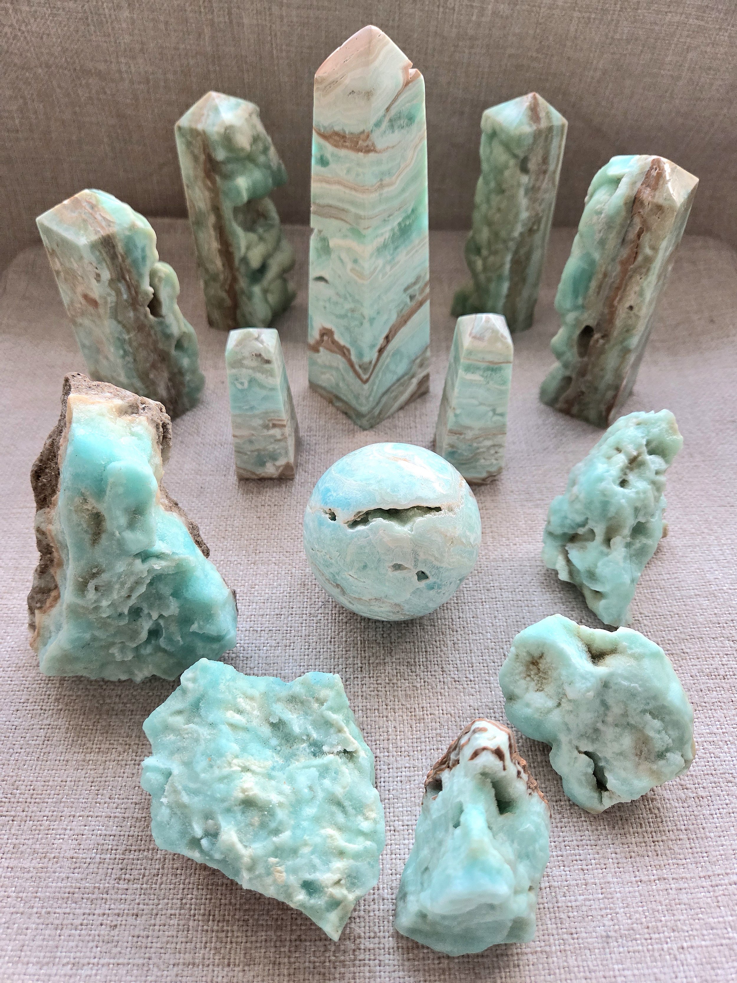 Blue Aragonite towers, spheres, and raw specimens