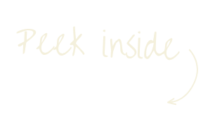 White handwritten text that says "Peak Inside"