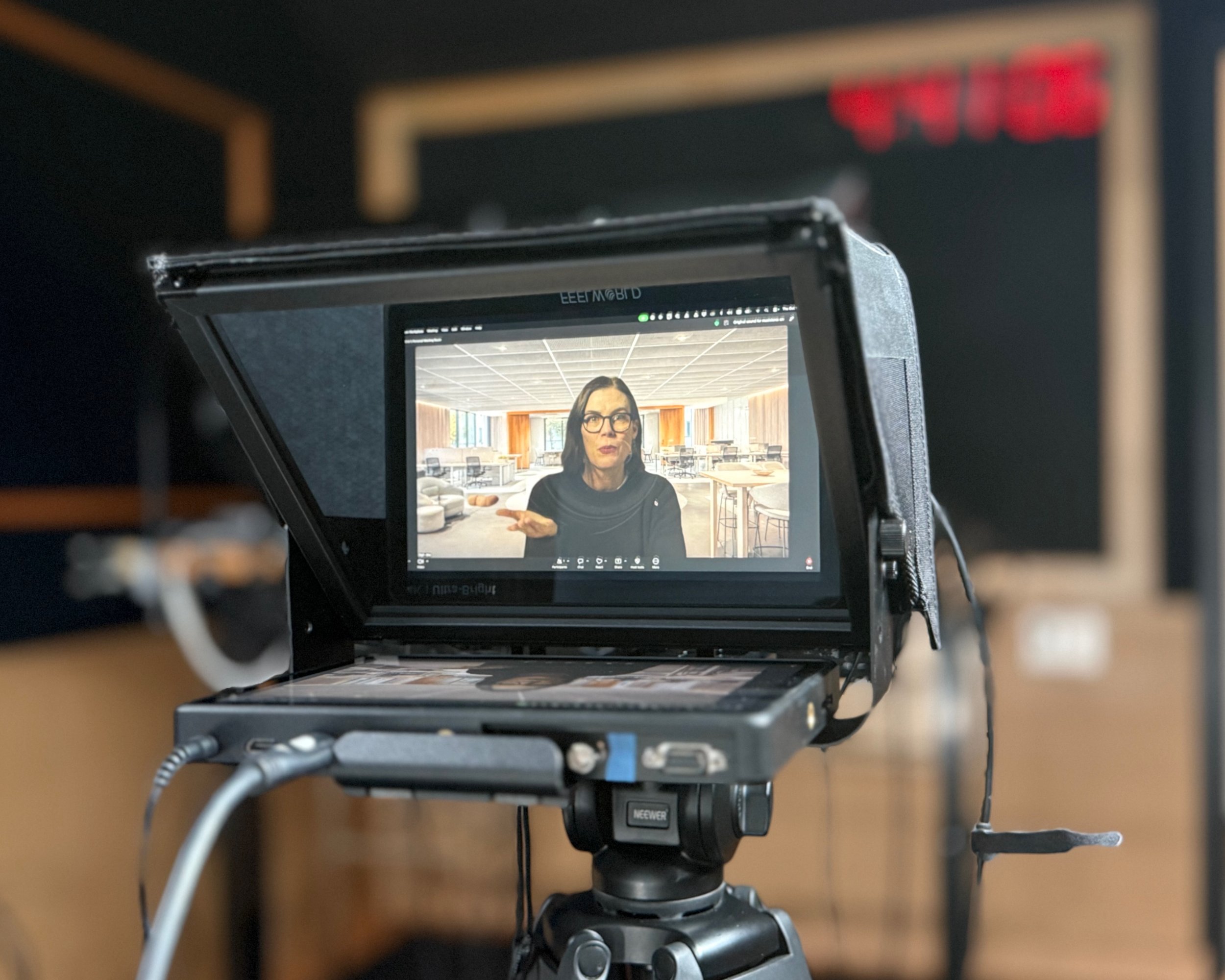 Remote interview guest appearing on a teleprompter at Studio TwentyOneTwelve
