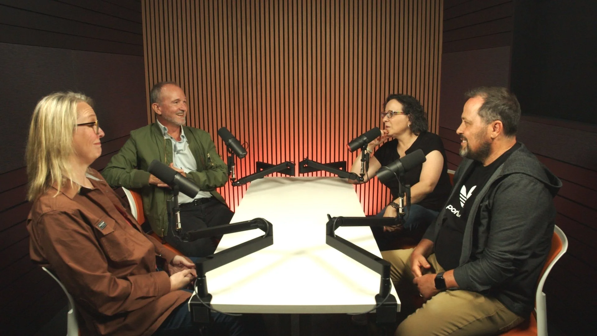 Four people recording a roundtable podcast on The Morrison set at Studio TwentyOneTwelve in Portland