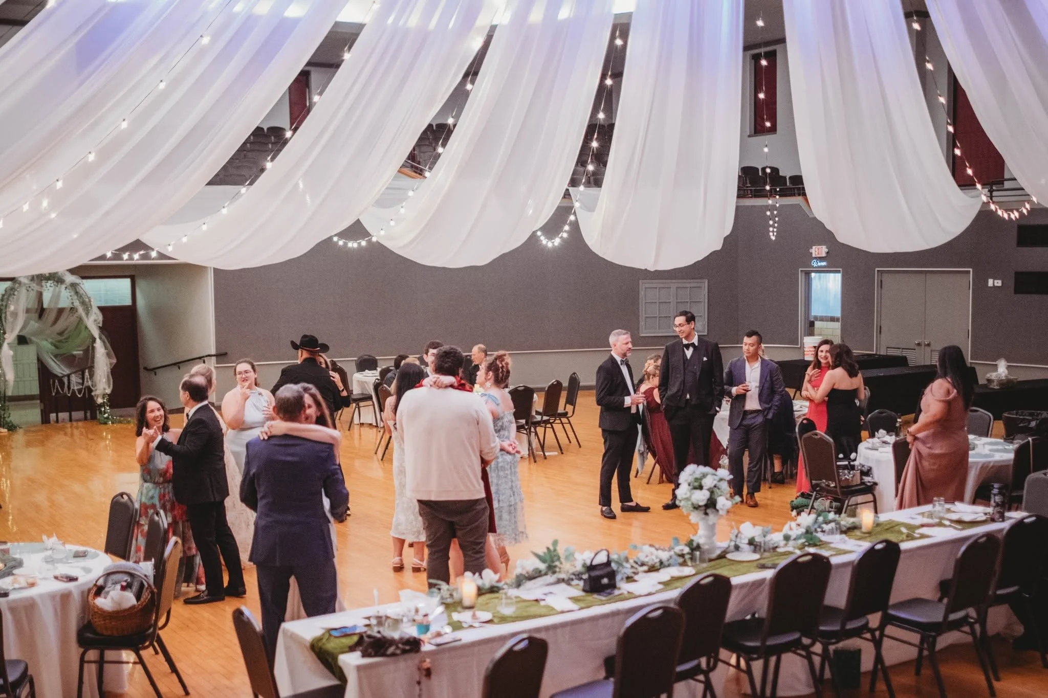 Image of a decorated room and people dancing