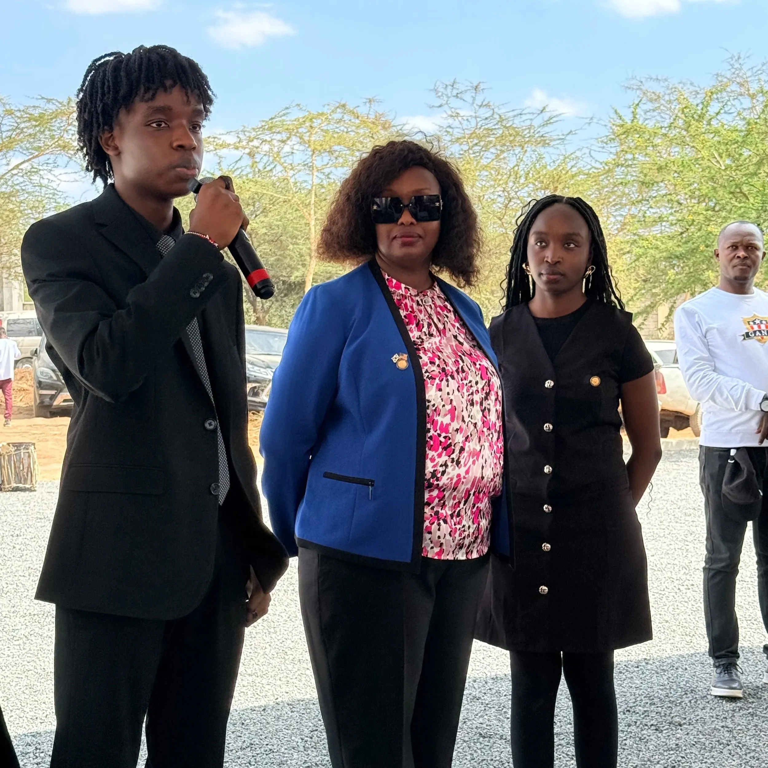 Nigel Wadoi, Captain Dr. Ikuah, and Melissa Wadoi giving a speech during opening ceremony of Green Leaf International School AI & Robotics. 
- USKAA GYLN Kenya Chapter President: Captain Dr. Ikurah. 
- Kenya Global Youth Leaders: Nigel Wadoi, Melissa