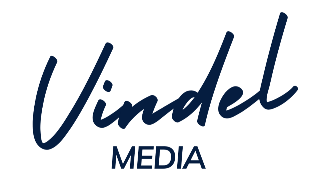 Vindel Media logo with stylized cursive text and bold uppercase font