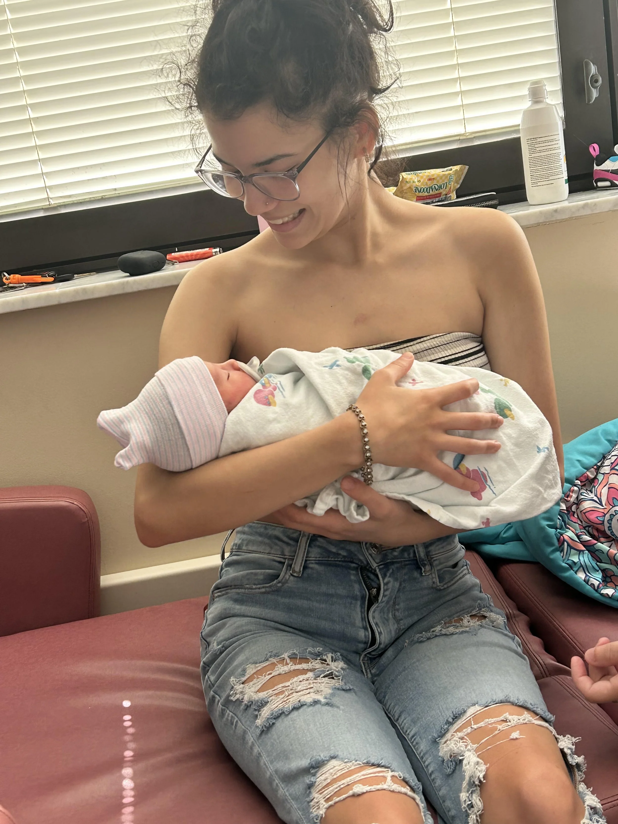 Makayla holding her baby niece.