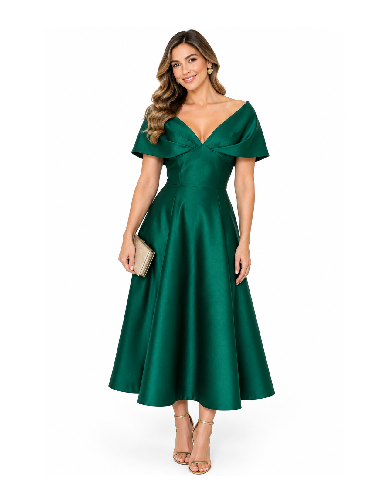 Woman in a long emerald green evening gown holding a gold clutch and wearing gold high heels, standing against a white background.