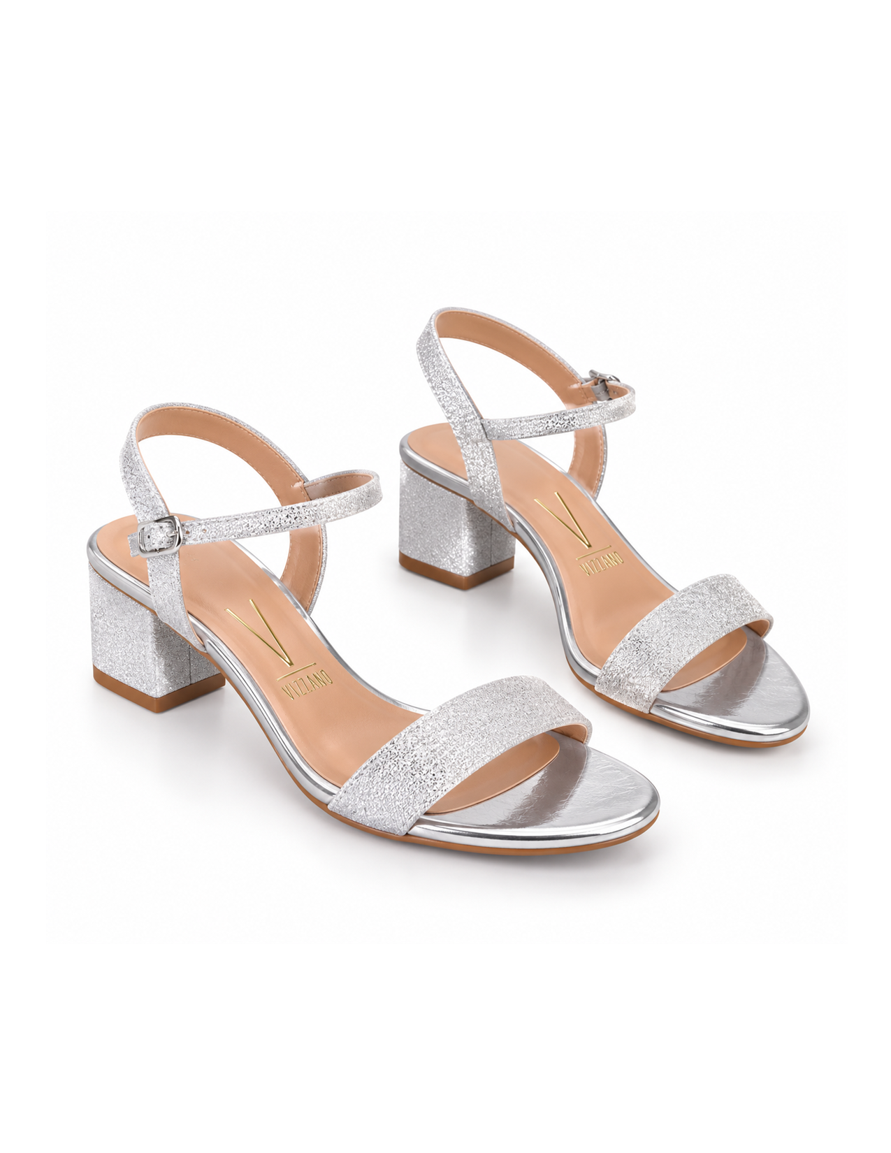 Pair of silver, glittery high-heeled sandals with ankle straps and block heels on a white background.