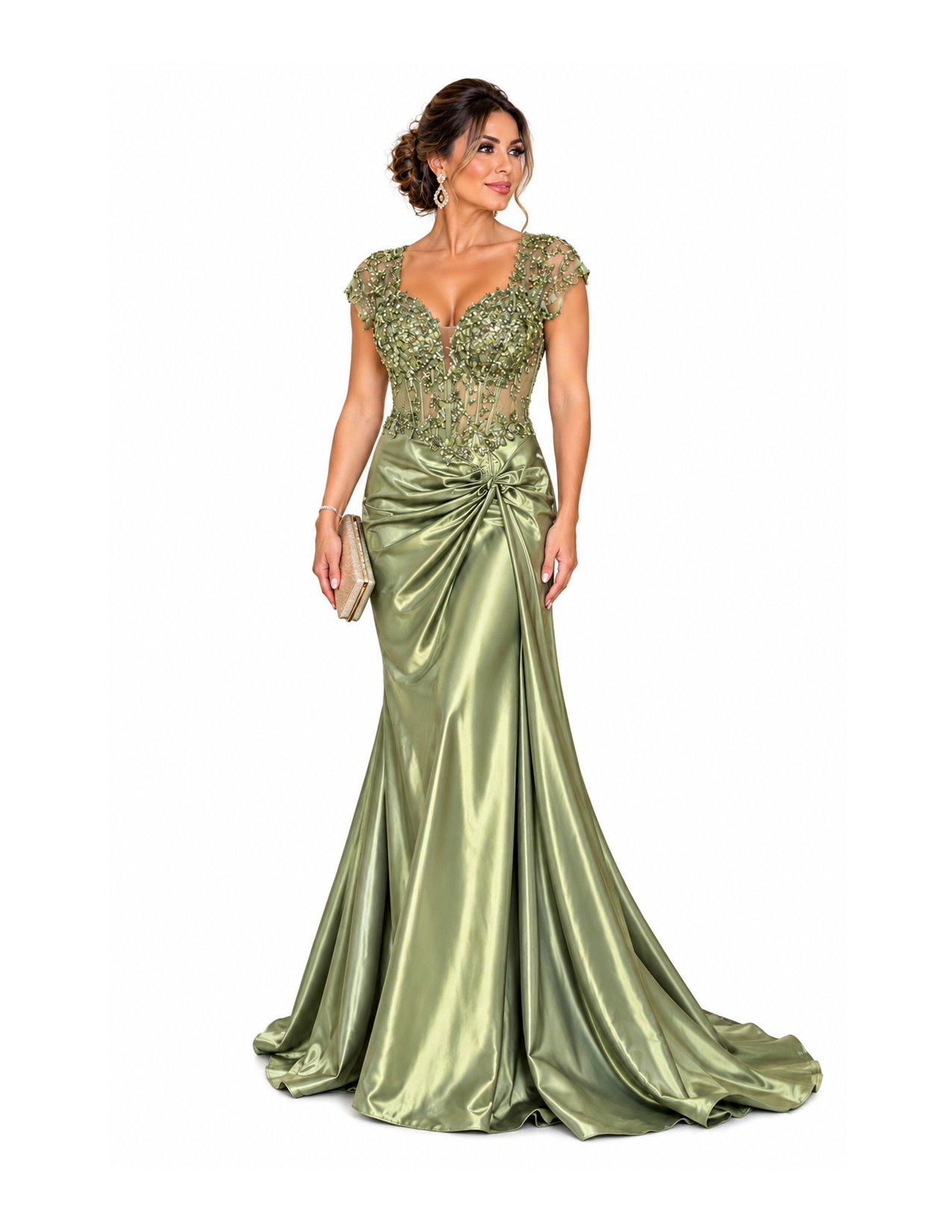 A woman wearing an elegant, shiny green evening gown with intricate lace and beaded embroidery on the bodice, holding a small clutch purse, and standing against a plain white background.
