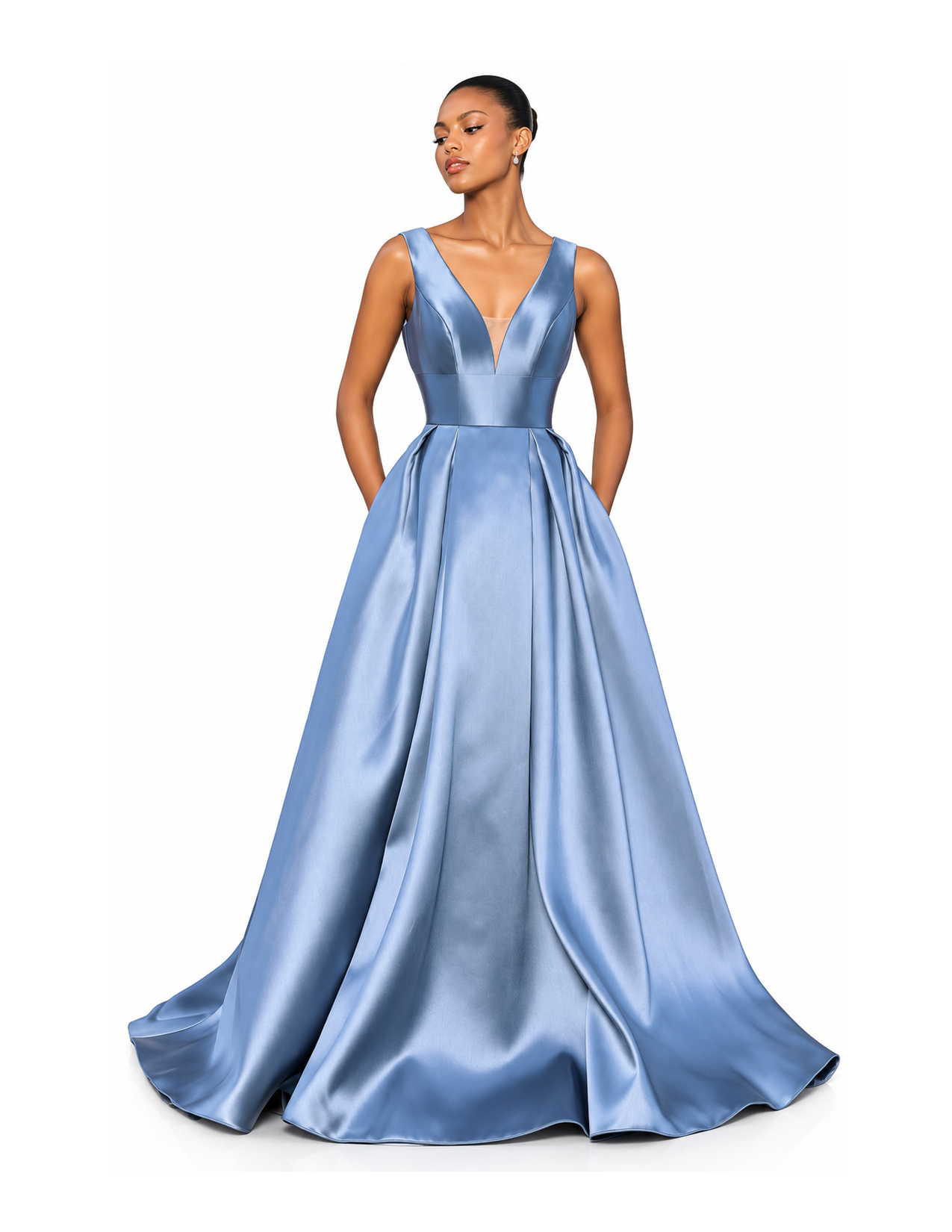 A woman in a shiny, blue satin ball gown with a deep V neckline and a full, pleated skirt, standing against a white background.