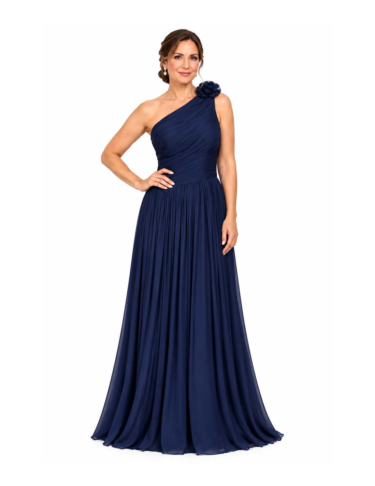 Woman wearing a navy blue, one-shoulder, pleated evening gown with a floral accent on the shoulder, standing against a white background.