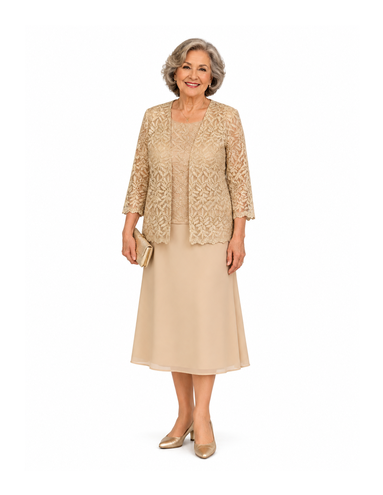 An elderly woman with gray curly hair in a beige elegance dress, matching lace jacket, beige heels, carrying a beige clutch, smiling standing against a plain white background.