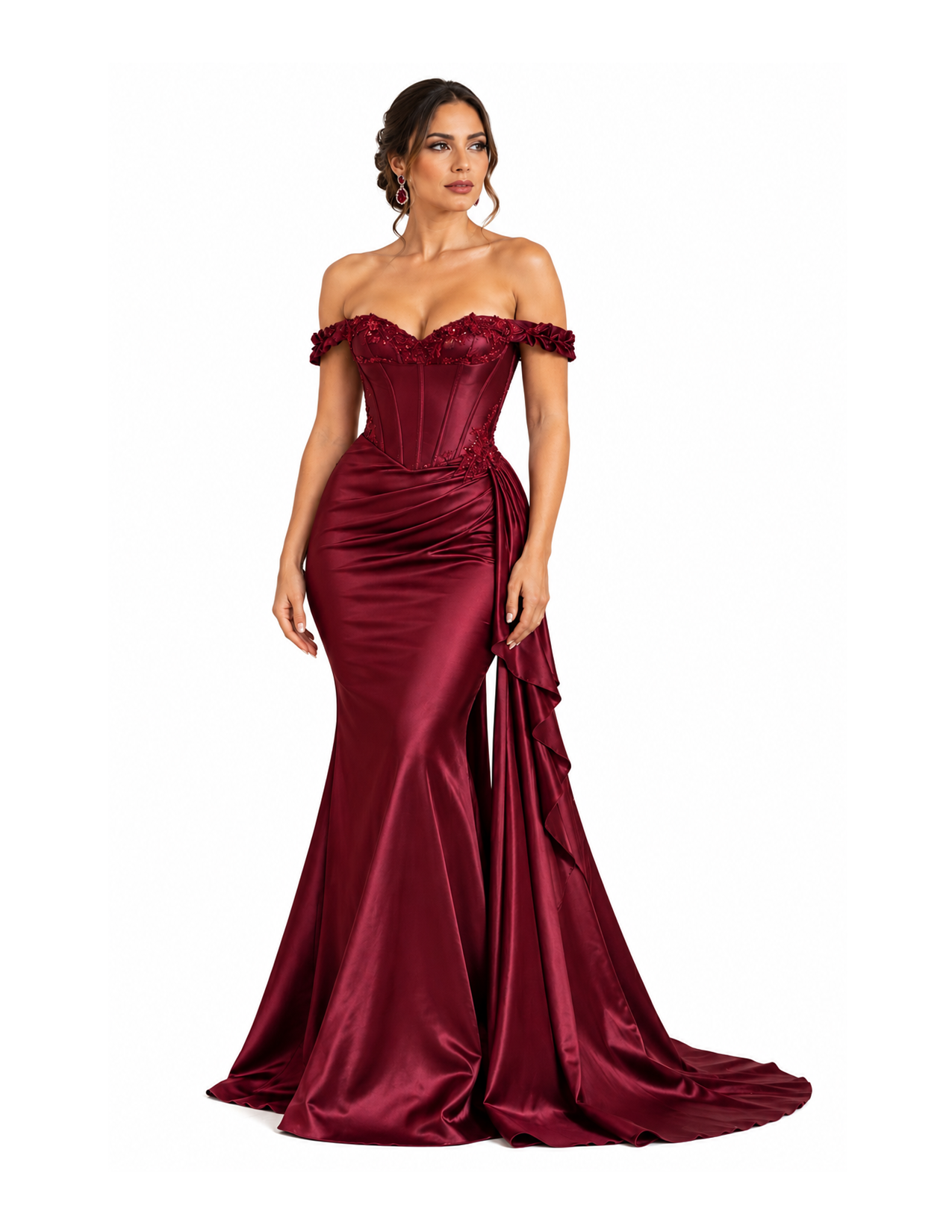 A woman in a long, elegant, red satin off-shoulder evening gown with lace and floral embellishments, standing against a white background.