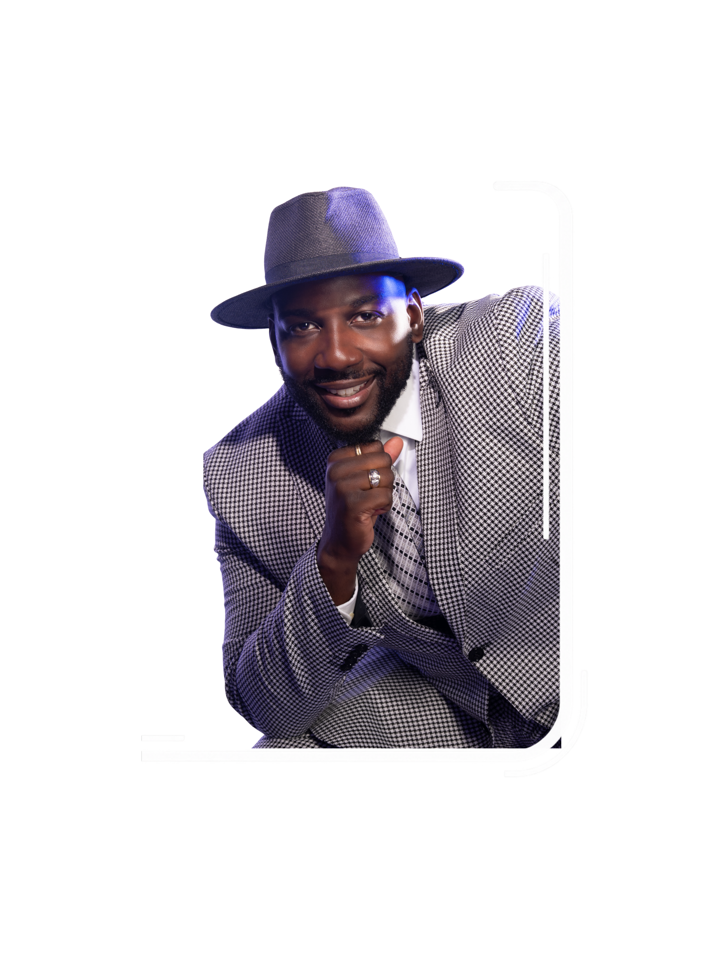 A smiling man wearing a checkered blazer and a wide-brimmed hat, leaning on a white cane.