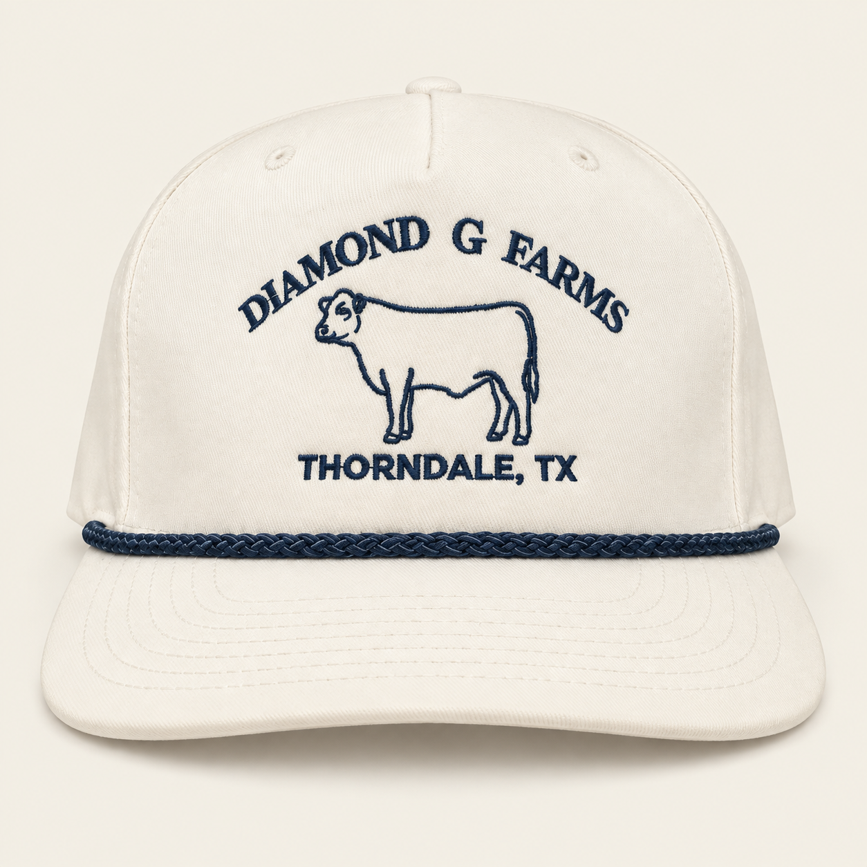 Cream Diamond G Farms rope hat with navy cattle embroidery and Thorndale, TX lettering.