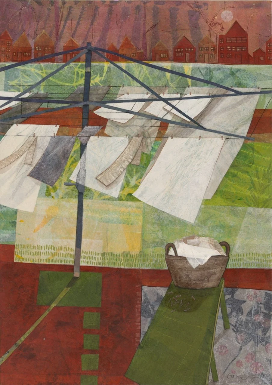 Colorful watercolor painting of an outdoor scene with a clothesline holding white sheets and clothespins, a green bench with a cloth, and a basket. In the background are houses and trees under a moonlit sky.
