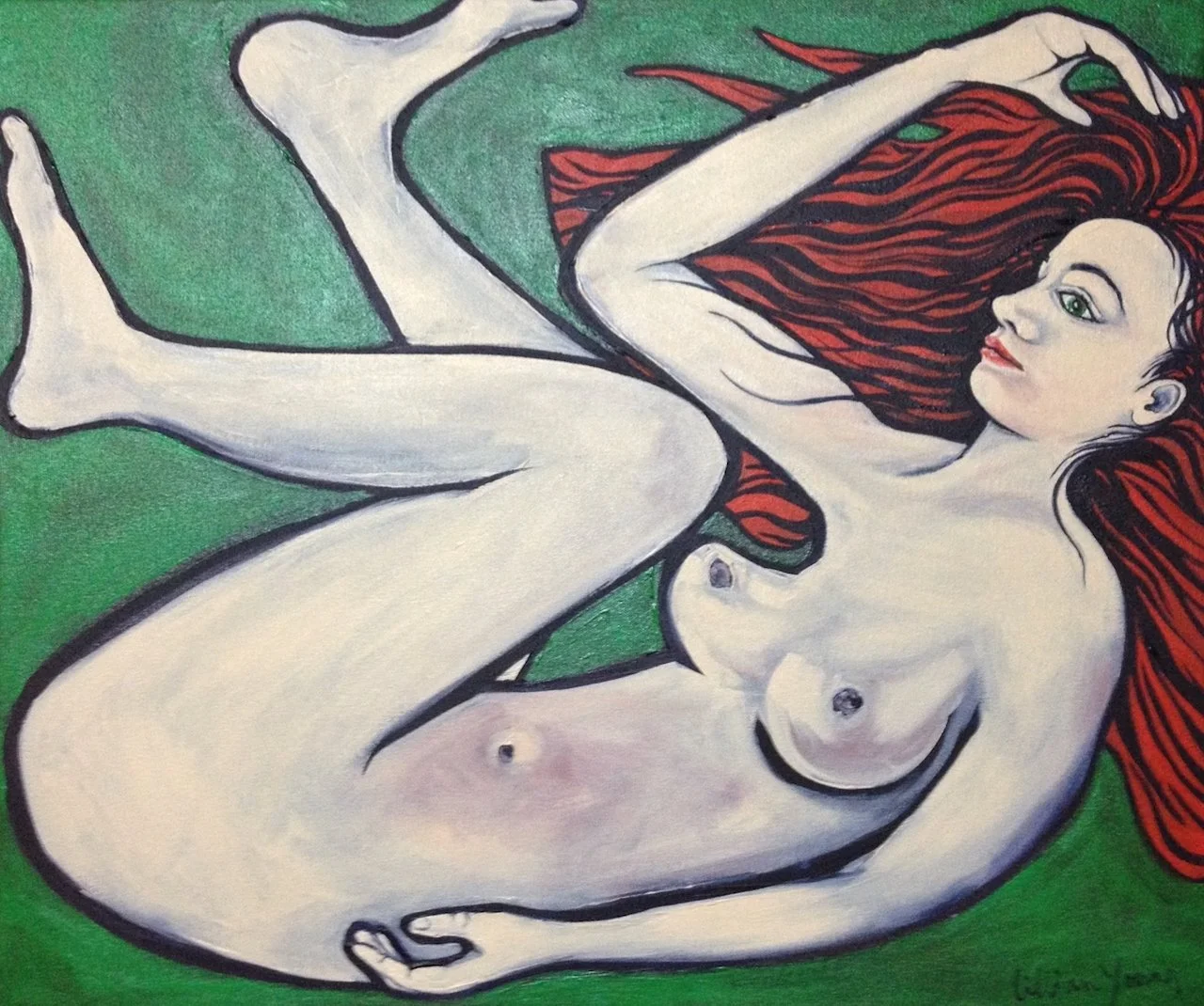 A nude woman with red hair lying on a green surface, with one arm raised above her head and one leg bent.