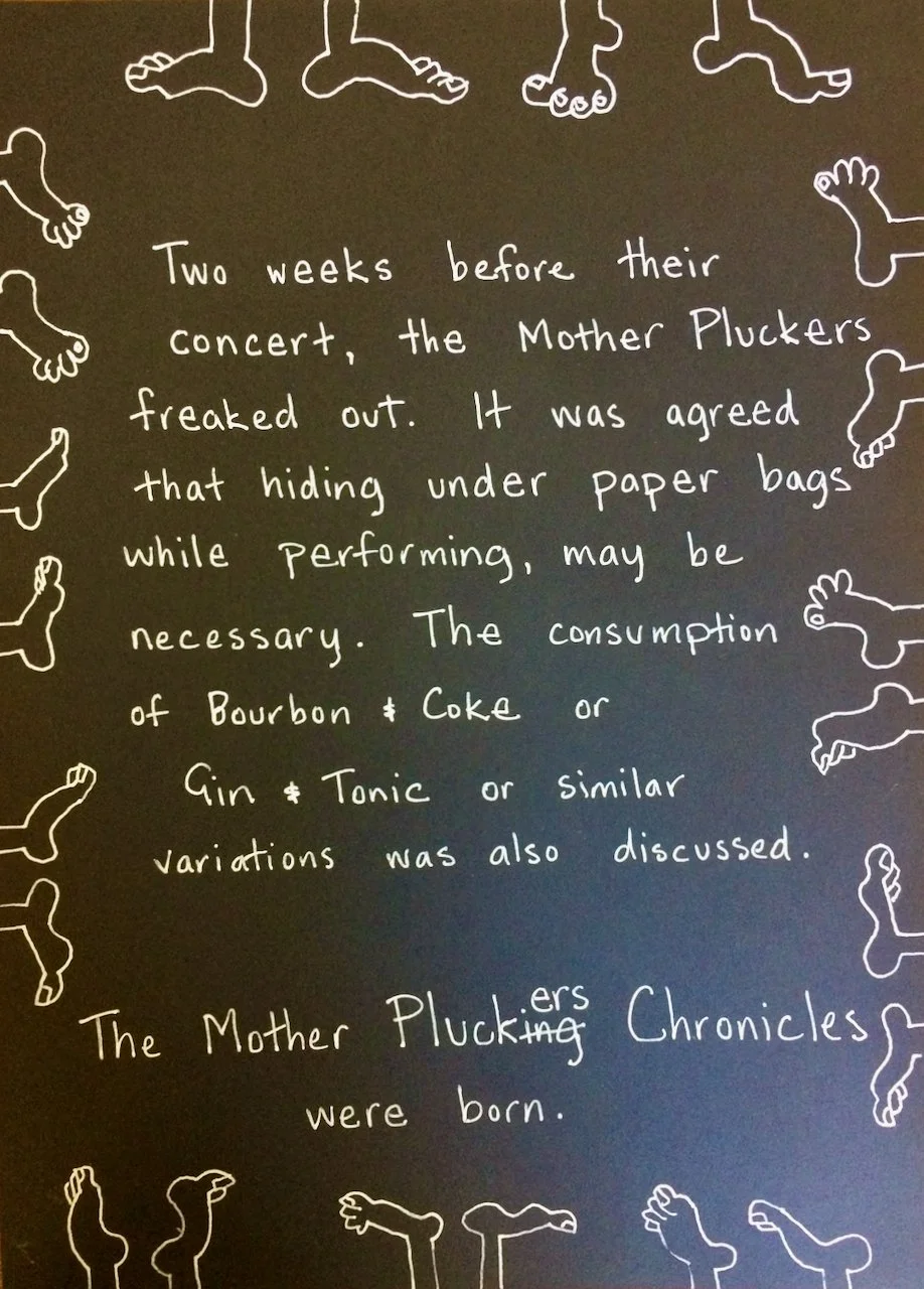 A blackboard with handwritten text about the Mother Pluckers, surrounded by white outlines of various footprints.