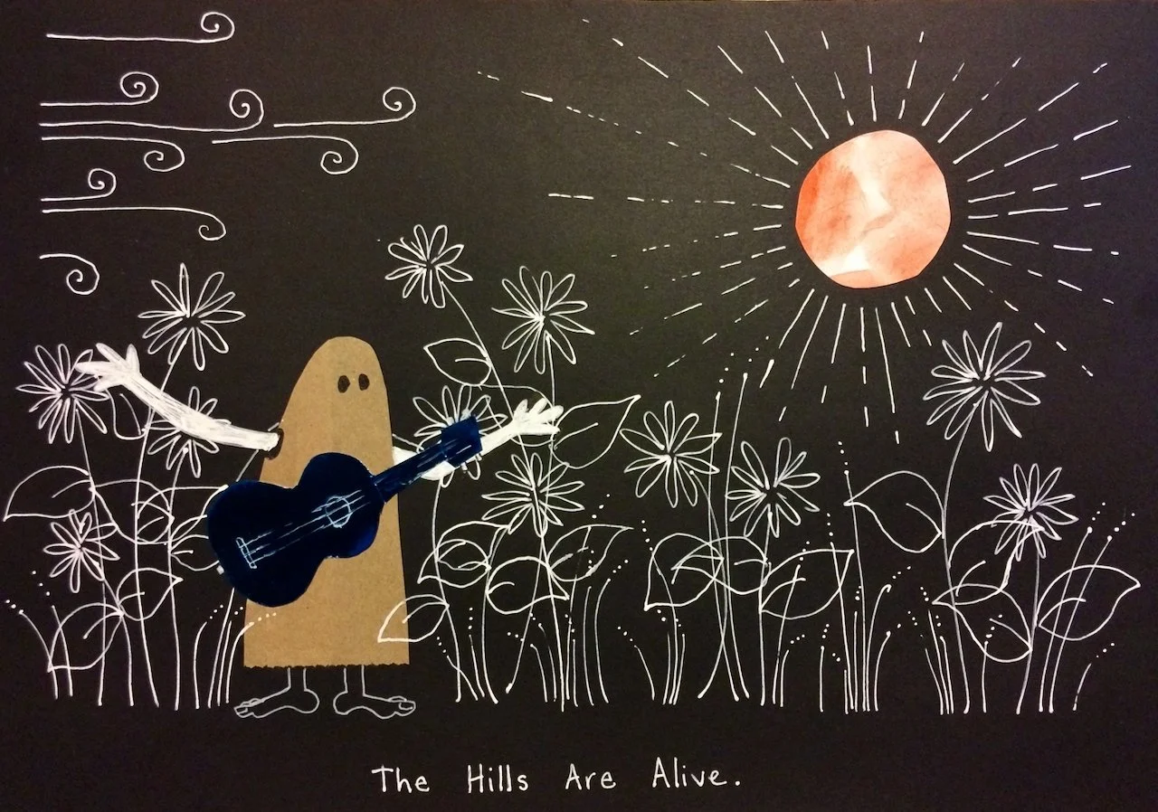 A whimsical drawing of a creature with a peanut-shaped body, two dots for eyes, and bird-like feet, holding a dark blue guitar, standing among white outline flowers and leaves on a black background. A large orange and pink sun with rays reaches acros