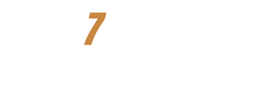 Graphic with the number 7 above the white text “SLAGEN PER TRAJECT” on a black background.