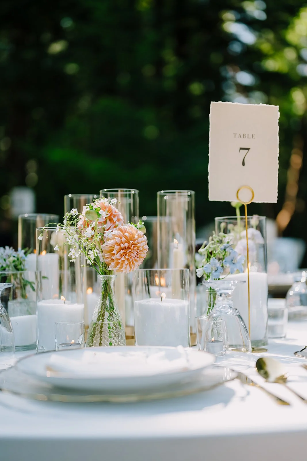 Elegant reception table with floral centerpieces