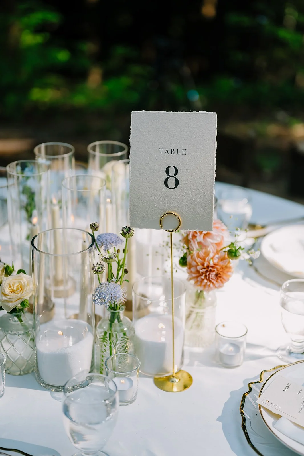 Floral reception tablescape with delicate centerpieces