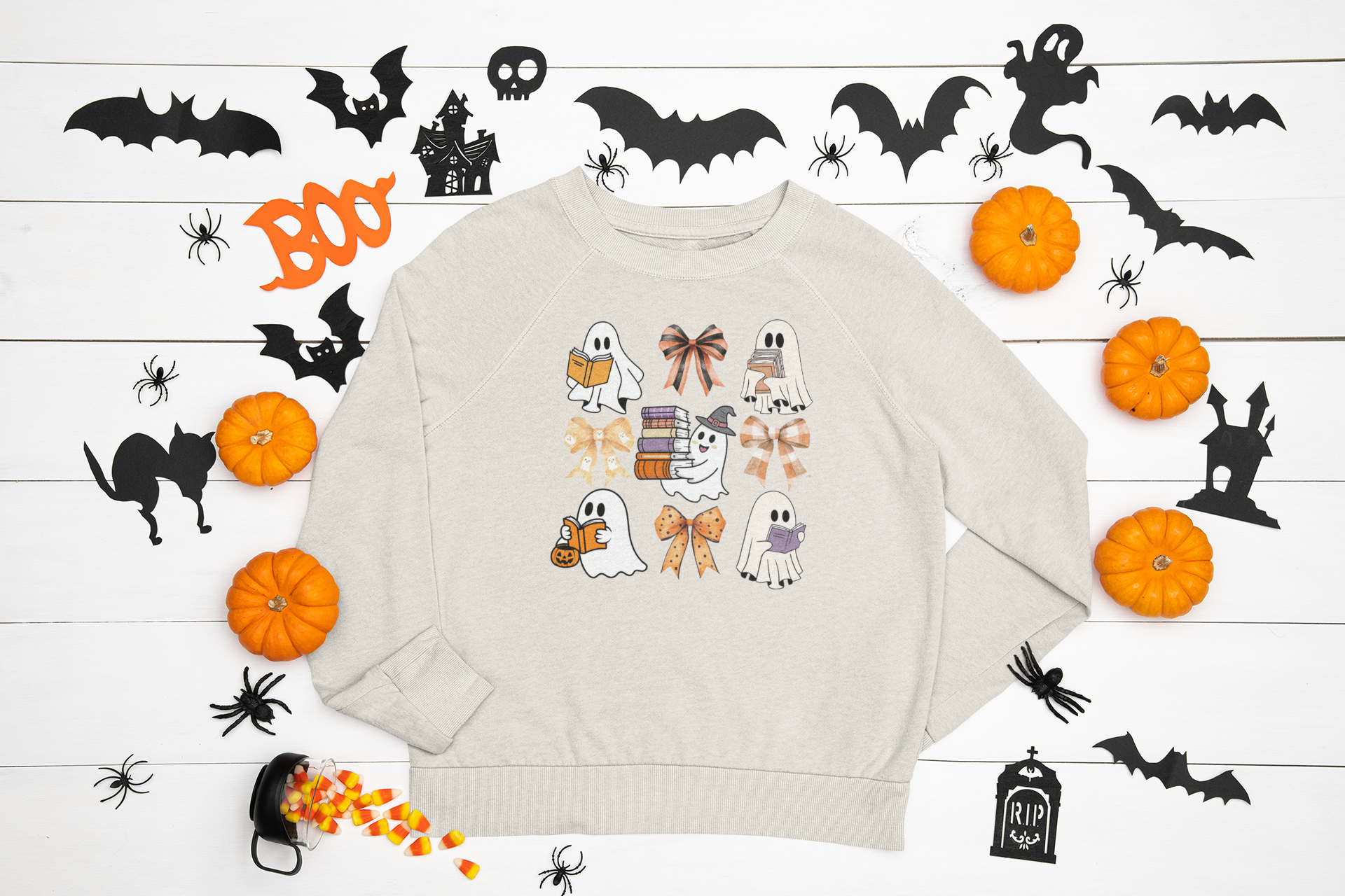 mockup-of-a-flat-laid-sweatshirt-featuring-a-halloween-decoration-m92.png